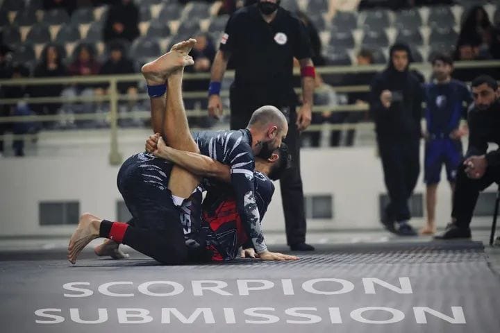 IRAO fighter working an armbar in competition